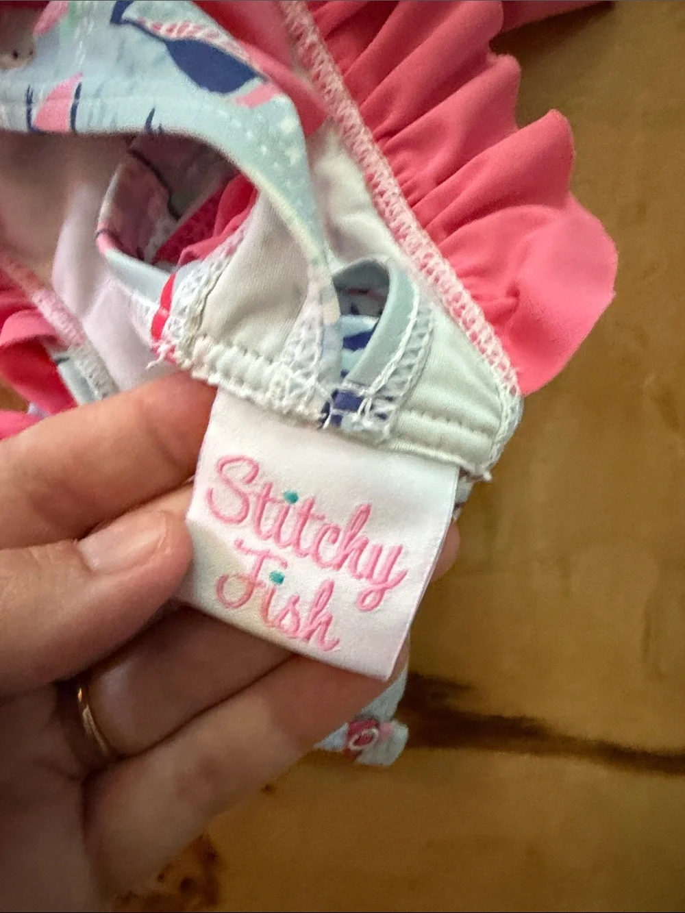 Stitchy Fish Sailboat One-Piece Swimsuit with Pink Ruffle & Bow